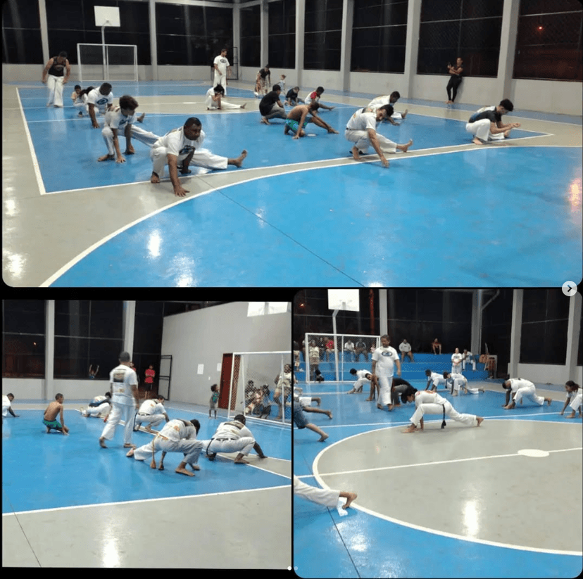 Treinamento de capoeira em um ginásio esportivo.